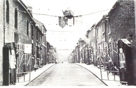 New Street where the Concars lived. The photo was taken during the Coronation celebrations, 1953 (courtesy of the late Roy Mitchell). The Concars lived in one of the houses on the left in the middle distance.